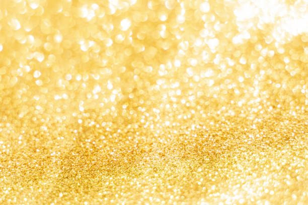 istock Gold glitter defocused texture background. gold christmas abstract background 1458253024