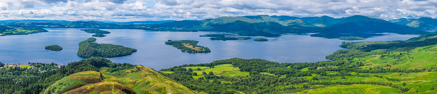 Panoramic view from Conic Hill and the West Highland Way over Loch Lomond and the mountains beyond, Scotland, UK.
