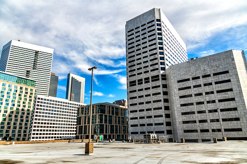 Skyscrapers surrounding the roof of a public parking structure in downtown Houston, Texas.