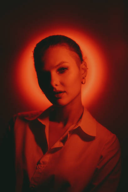 istock Young woman portrait on neon background 1458267768