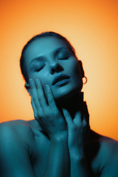 istock Creative shadow play on female body. 1458267852