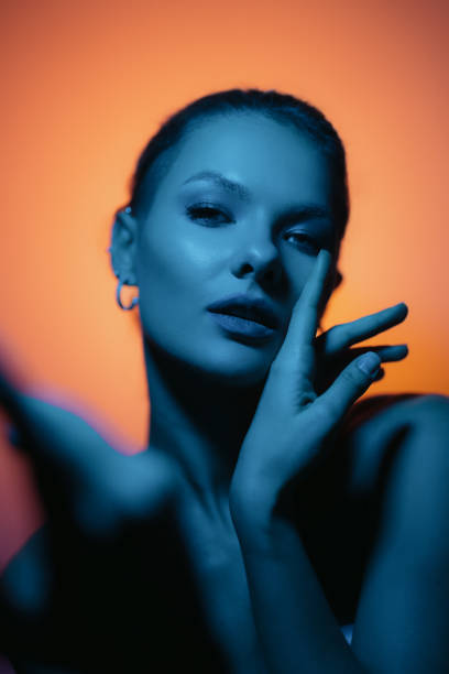 istock Creative shadow play on female body. 1458267874