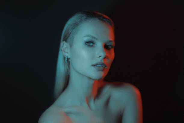 istock Creative lights play on female body. 1458267890