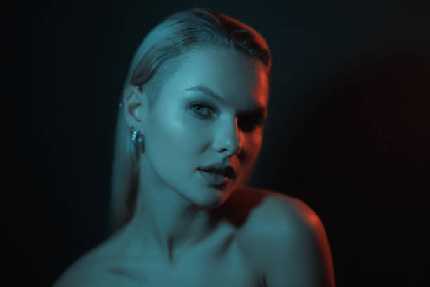 istock Creative lights play on female body. 1458267894