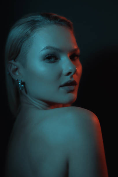 istock Creative lights play on female body. 1458267913