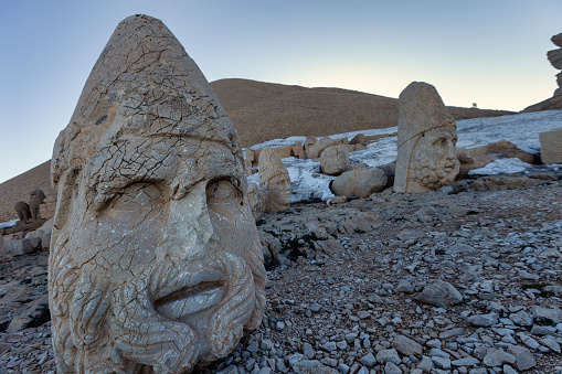 Zeus statue at West Terrace on top of Nemrut Mountain. Stone heads at the top of 2150 meters high Mount Nemrut. Turkey