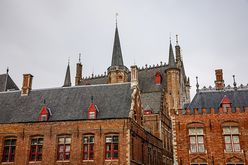 Gothic architecture in Flanders. Palace spiers in Bruges, Belgium