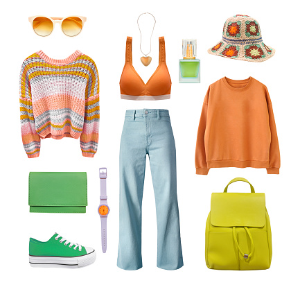 Orange green modern casual clothes isolated on white, set of bright spring female clothing. Women's apparel and accessories.