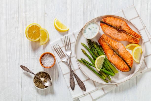 istock roast salmon steaks with asparagus and dill sauce 1458280934