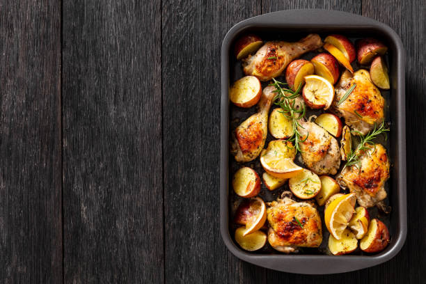istock Lemon Garlic Chicken with roast potatoes, top view 1458281091