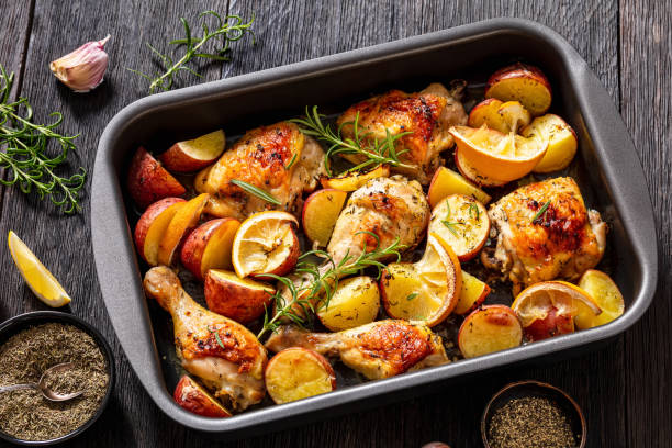 istock Lemon Garlic Chicken with roast potatoes, top view 1458281121