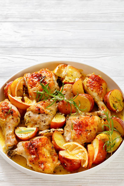 istock Lemon Garlic Chicken with roast potatoes, top view 1458281152
