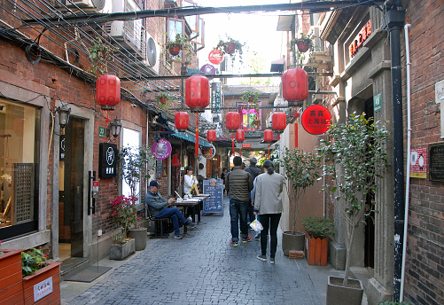 Tianzifang in Shanghai, China. Tianzifang district is an area of alleyways in Shanghai known for art and craft stores, coffee shops and art studios.