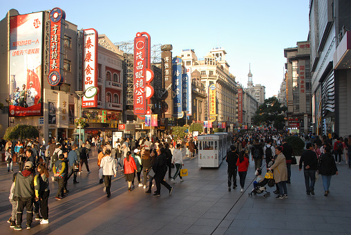 Nanjing Road in Shanghai, China. Nanjing Road (Nanjing Lu) is a busy shopping street in Shanghai.