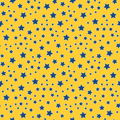 Seamless pattern of blue stars on a yellow background. Children bright pattern. Contrasting star pattern for wrapping paper. Vector illustration