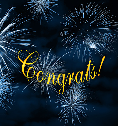 CONGRATS lettering with beautiful fireworks on a night blue sky background. Can be used as a congratulation holiday card / background / invitation / banner.