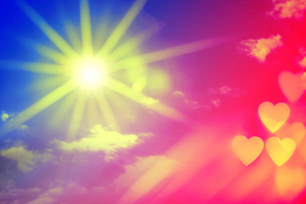 istock Sky with shining sun and heart shaped bokeh (toned image) 1458289332