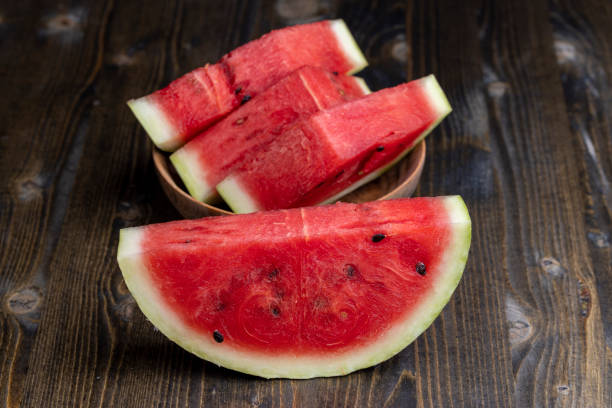istock Sliced red and ripe watermelon on the table 1458290233