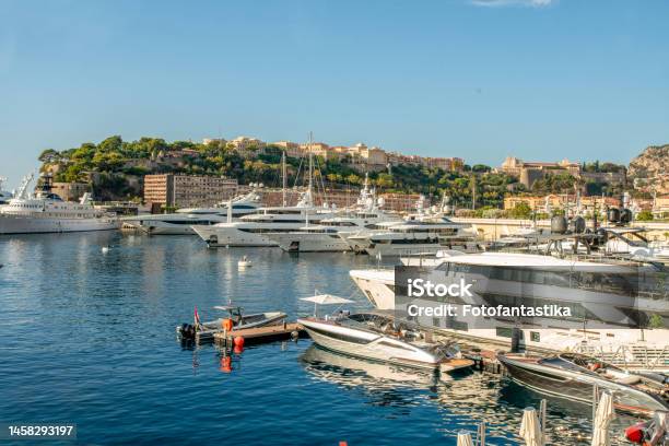 Idyllic View Of The Harbor Of Monaco With Luxury Yachts And The Skyline Of Monaco And Rear Side Of The Princes Palace Of Monaco Stock Photo - Download Image Now