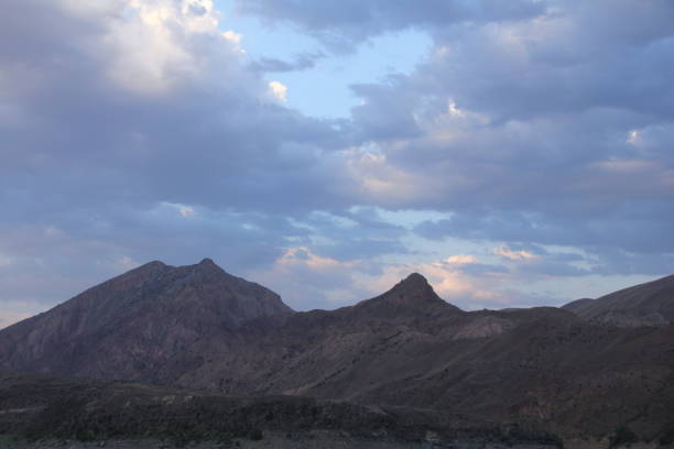 istock Scenic View Of Mountains Against Sky. 1458294268