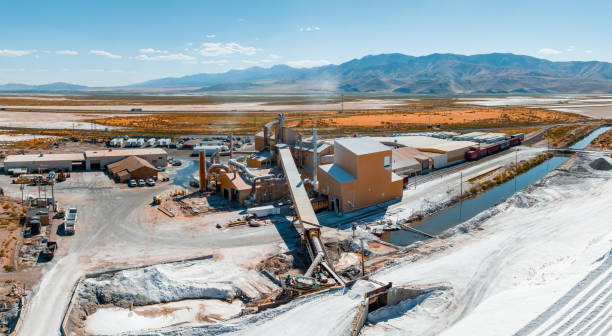 salt lake city, utah landscape with desert salt mining factory - lakebed imagens e fotografias de stock