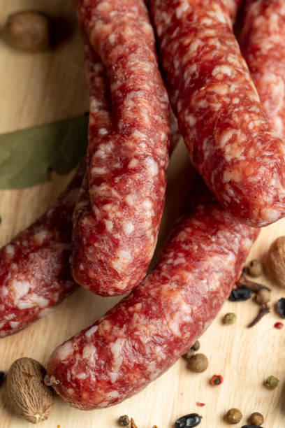 istock Dried veal sausage during slicing 1458302182