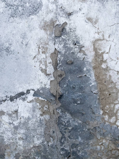 istock Fragment of old dirty wall with scratches and cracks. 1458302234
