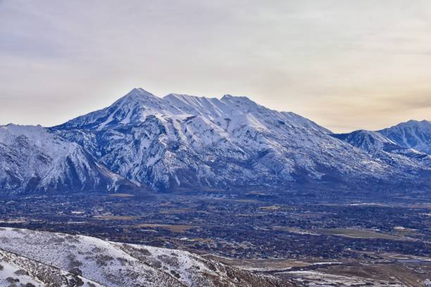 Timpanogos Peak snow covered mountain views from Maack Hill hiking Lone Peak Wilderness Wasatch Rocky Mountains, Utah. United States. stock photo