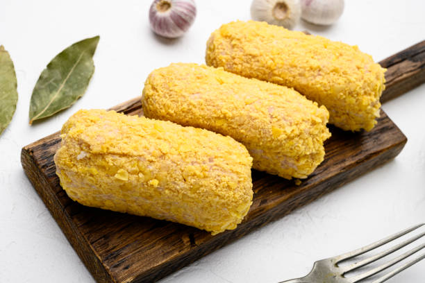 istock Chicken rissoles and ingredients, on white stone table background 1458313120