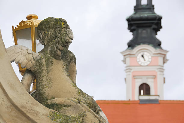 istock Angel looking at church 145832315