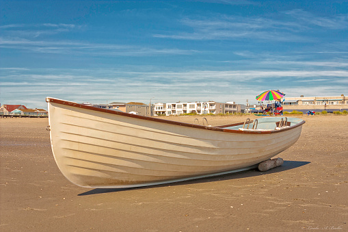 A picture of a life boat on the beach in Ocean City , New Jersey