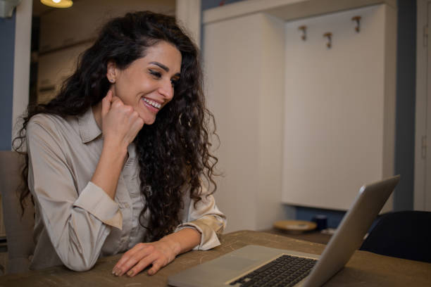 istock Young woman working from home 1458329269