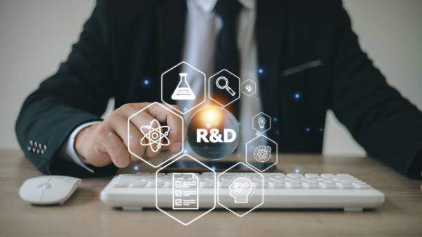 istock R and D icon for Research and Development on laptop screen. Manage costs more efficiently. R and D innovation concept. 1458330146