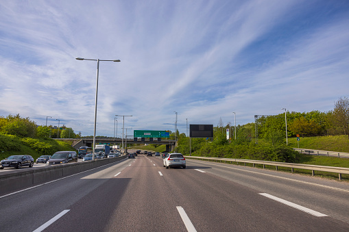 Sweden. Stockholm. 09.25.2022. Beautiful view of highway with moving cars on summer day.