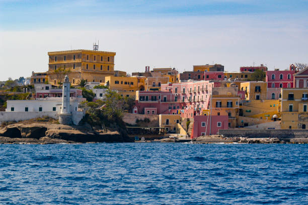 Entering the harbor at Ventotene from the sea Looking at the village on Ventotene, Italy. stock photo
