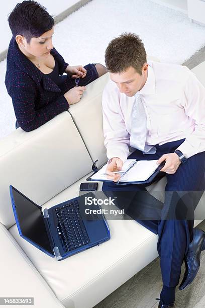 Businesspeople Working Together Stock Photo - Download Image Now - Cooperation, Full Suit, Office