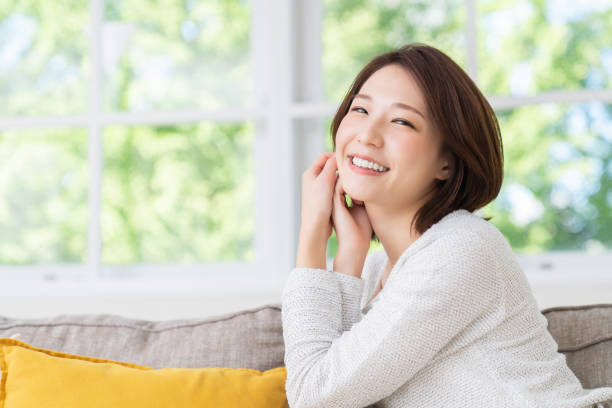 istock attractive asian woman relaxing 1458336960