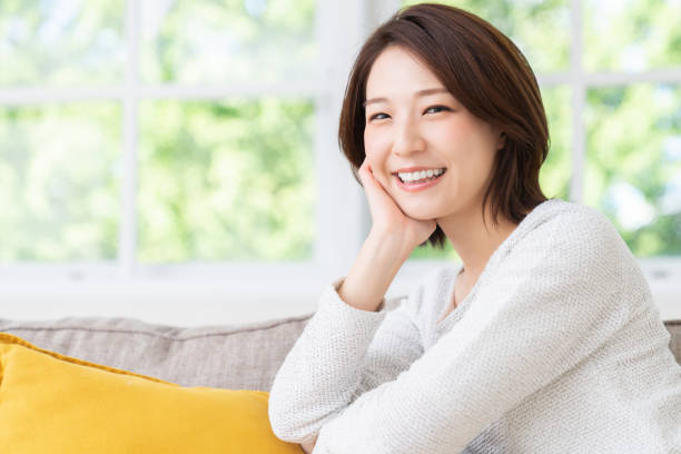 istock attractive asian woman relaxing 1458336987