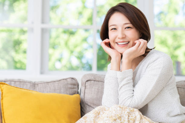 istock attractive asian woman relaxing 1458336993