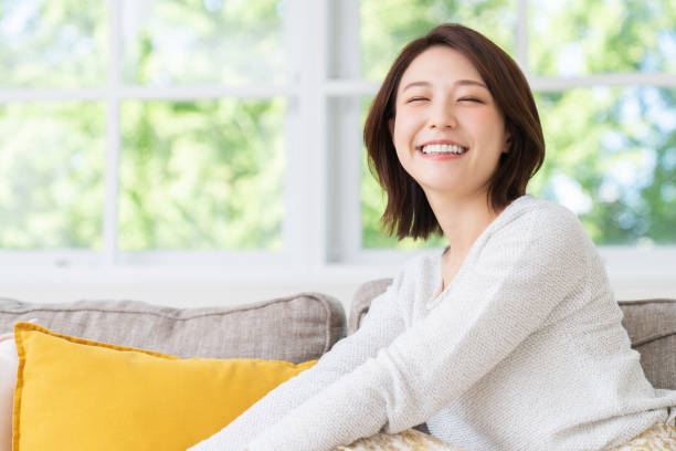 istock attractive asian woman relaxing 1458336998
