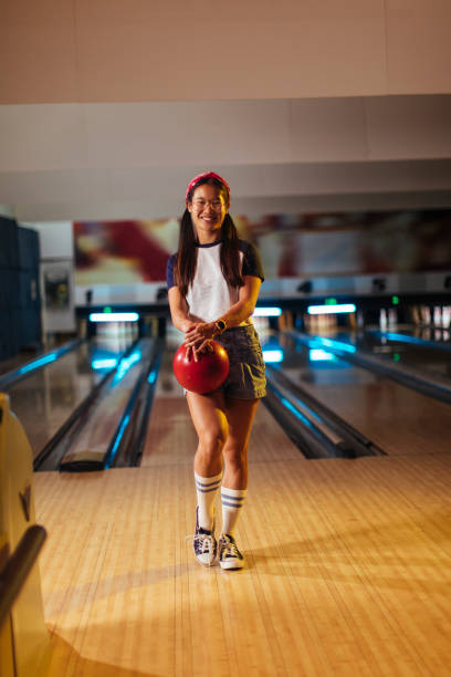 istock Asian girl bowler 1458342754