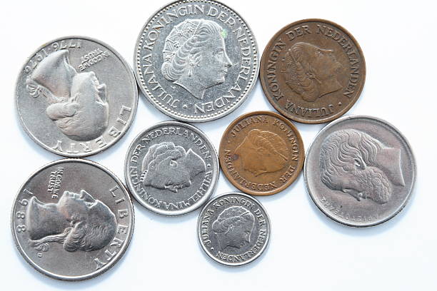 istock Eight old coins from different contries on white background 145834344