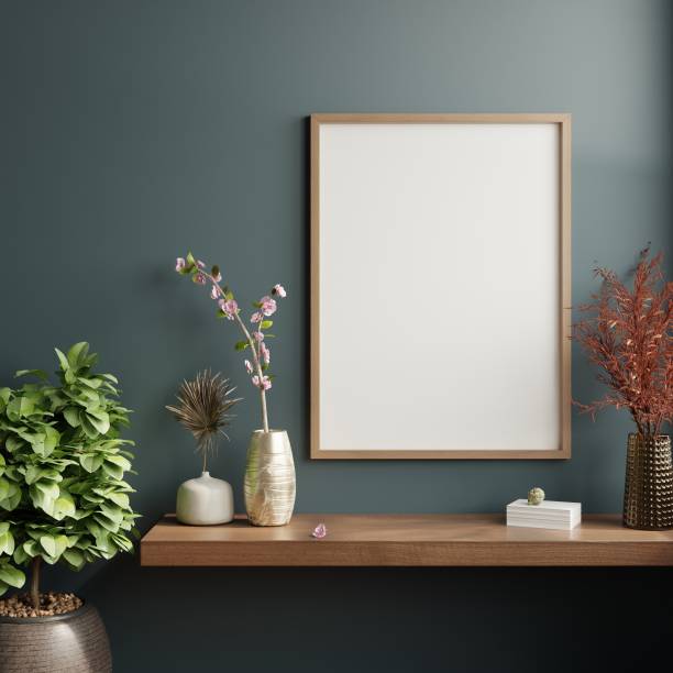 Mockup poster frame in minimalist interior background with dark wall. Mockup poster frame in minimalist interior background with dark wall.3d rendering thai decor stock pictures, royalty-free photos & images