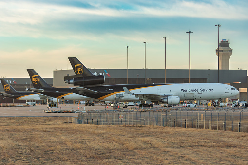 UPS cargo airplanes waiting at the terminal at Dallas Fort Worth International Airport in Texas