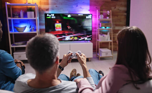 istock Rear View Of An People Playing Video Games 1458345007