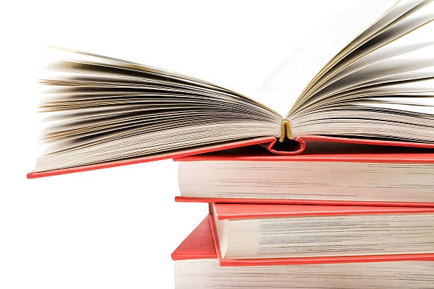 istock Stack of books with the top one open for studying 145834566