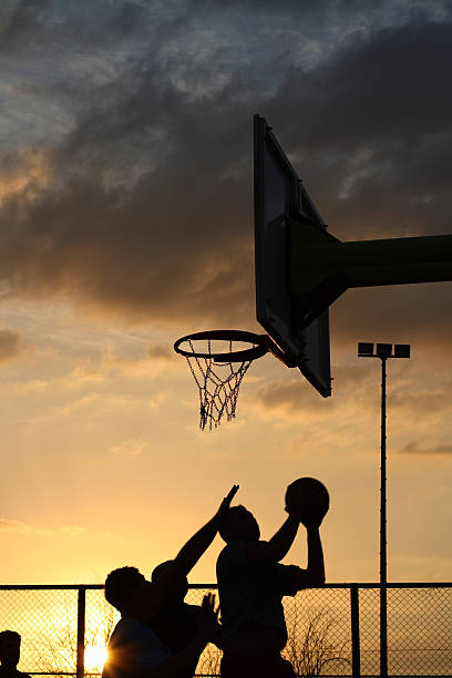 istock basketball players at the sunset 145834585
