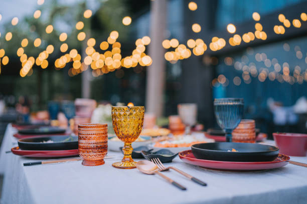 Outdoor Dining place setting with Asian Food stock photo