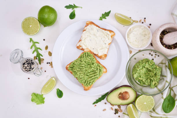 istock avocado and cream cheese toasts on a plate and ingredients 1458348761