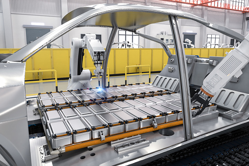 Automation automobile factory concept with 3d rendering robot assembly line with electric car battery cells module on platform